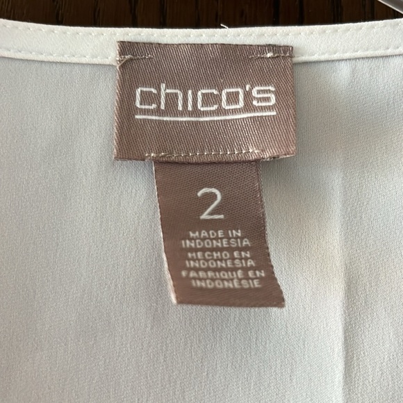 Chico’s sleeveless white blouse with a ruffle at the neck. Size Chico 2 - Picture 2 of 6